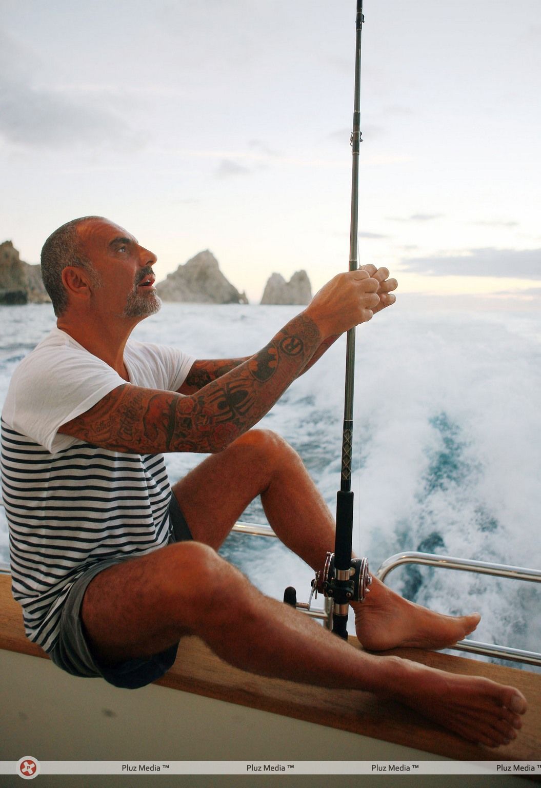 Christian Audigier catches a huge fish with his girlfriend Nathalie Sorensen | Picture 124263